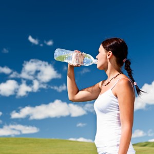 Young woman drinking water